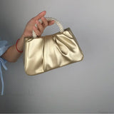 Clutch de noche con asa de cuentas