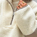Sudadera holgada con cuello alto confeccionada en suave tejido polar.