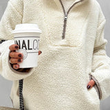 Sudadera holgada con cuello alto confeccionada en suave tejido polar.