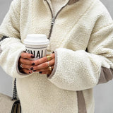 Sudadera holgada con cuello alto confeccionada en suave tejido polar.