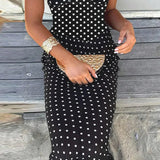 Vestido largo de lunares con aberturas