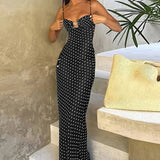 Vestido largo de lunares con aberturas