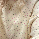 Bonita sudadera de cuello redondo con lunares