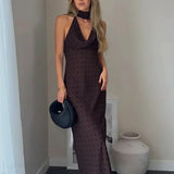 Vestido largo de lunares con espalda descubierta y cuello bufanda