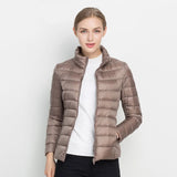 Chaqueta acolchada verde vibrante, elegante y cómoda para mujer.