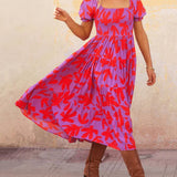 Vestido midi estampado con mangas abullonadas y un encantador escote cuadrado