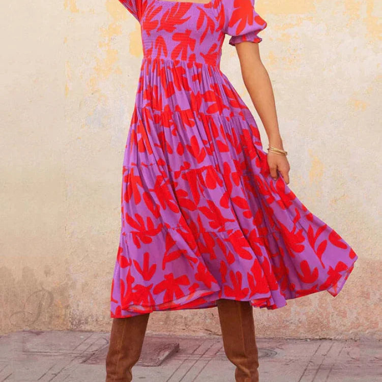 Vestido midi estampado con mangas abullonadas y un encantador escote cuadrado