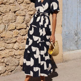 Vestido midi con mangas abullonadas y escote en pico, encantador estampado geométrico