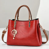 Bolso de hombro sencillo y liso para mujeres mayores.
