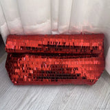 Clutch de cuero con lentejuelas rojas