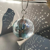 Clutch de noche con bola de discoteca reflectante