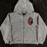Sudadera con capucha de corte relajado con bordado de corazón y cadena en 3D.
