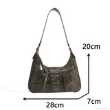 Bolso de hombro de piel sintética con cinturón retro.