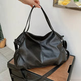 Bolso de mano retro de piel sintética de gran capacidad con correa para el hombro.