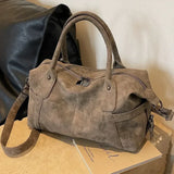 Bolso de mano retro de piel sintética de gran capacidad con correa para el hombro.