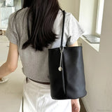 Bolso bandolera retro tipo cubo en piel suave