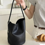 Bolso bandolera retro tipo cubo en piel suave