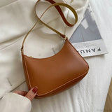 Bolso de hombro estilo hobo retro en piel sintética lisa.