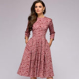 Vestido de mujer - Corte en A - Mangas 3/4 - Cuello redondo - Elegante estampado floral