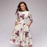 Vestido de mujer - Corte en A - Mangas 3/4 - Cuello redondo - Elegante estampado floral