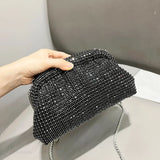 Clutch de noche de diseñador adornado con pedrería