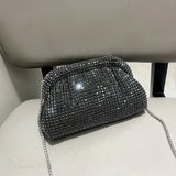 Clutch de noche de diseñador adornado con pedrería
