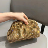 Clutch de noche de diseñador adornado con pedrería