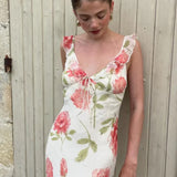 Vestido largo romántico con estampado floral y tirantes