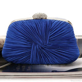Bolso de mano de boda en color azul real, tipo clutch, en forma de cojín y plisado.