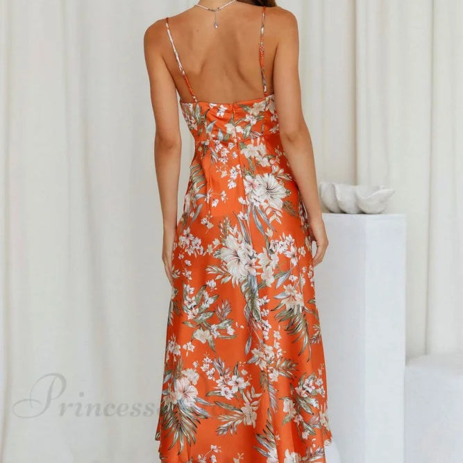 Vestido lencero de satén con cuello vuelto y estampado floral con abertura