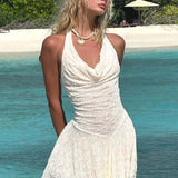 Vestido mini ajustado sexy con espalda abierta y paneles de encaje.