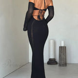 Vestido sexy con espalda descubierta, con tirantes, corte entallado y elegante, manga larga y escote pronunciado.