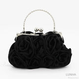 Clutch de noche con marco floral en rosa de seda.