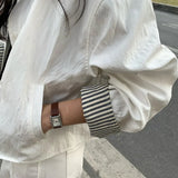 Chaqueta informal con mangas sencillas de patchwork de rayas.