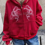 Sudadera corta con capucha y cremallera con estampado de serpiente y pedrería