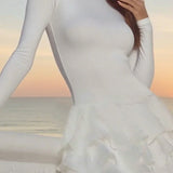 Vestido mini liso, abullonado, con cuello redondo y cintura alta.