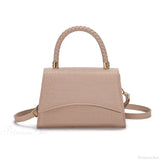 Bolso de hombro informal en piel sintética maciza con asa superior.