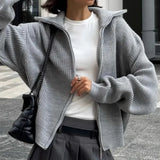 Chaleco sencillo y liso con cremallera, chaqueta informal de punto suelto.