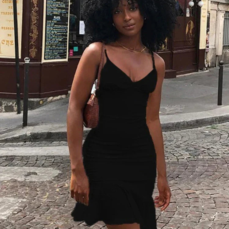 Vestido midi de verano sin mangas con tirantes finos y volantes, ideal para noches de club.