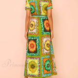 Elegante vestido midi con un estampado especial de girasoles.