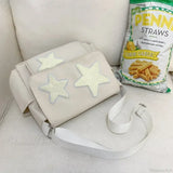 Bolso tote casual con estampado de estrellas estilo años 2000 y correa para el hombro.