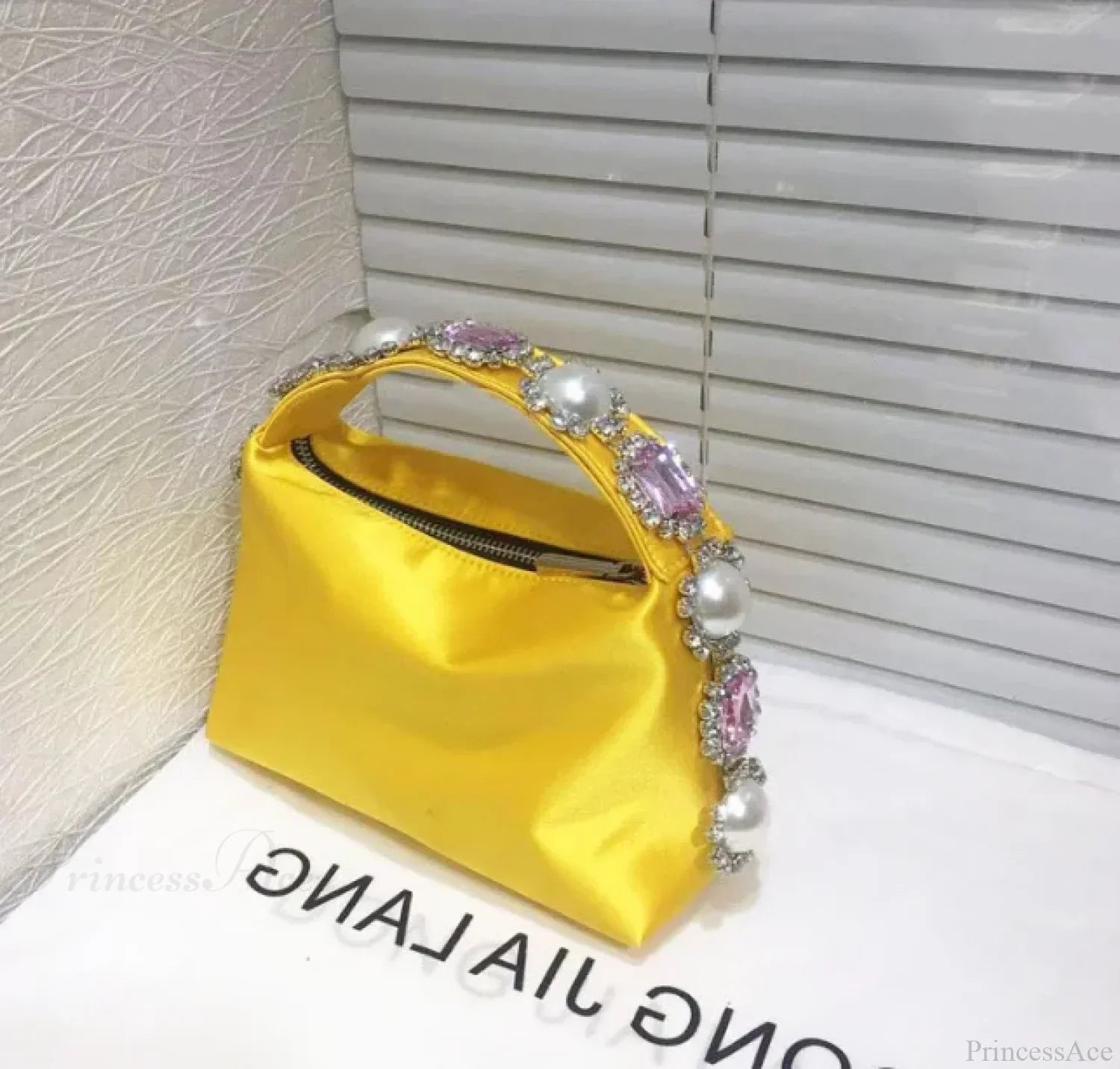 Bolsa de teléfono de seda con piedras
