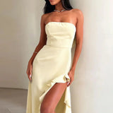 Vestido largo sin tirantes con abertura y volantes