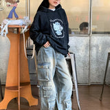 Pantalones cargo de mezclilla con parches y bolsillos estilo streetwear
