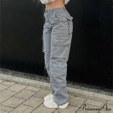 Pantalón streetwear con bolsillos, pernera ancha y cintura alta, corte recto.