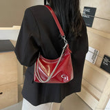 Elegante bolso de hombro de PU con cremallera.