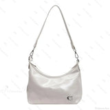 Elegante bolso de hombro de PU con cremallera.