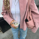 Chaqueta elegante e informal de ante de manga larga.