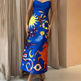 Vestido midi sexy de verano en satén con diseño sin espalda, detalles estampados y sin mangas.