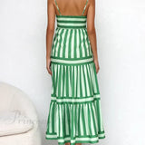 Vestido midi con tirantes, espalda abierta, rayas, estampado elegante y bolsillos.